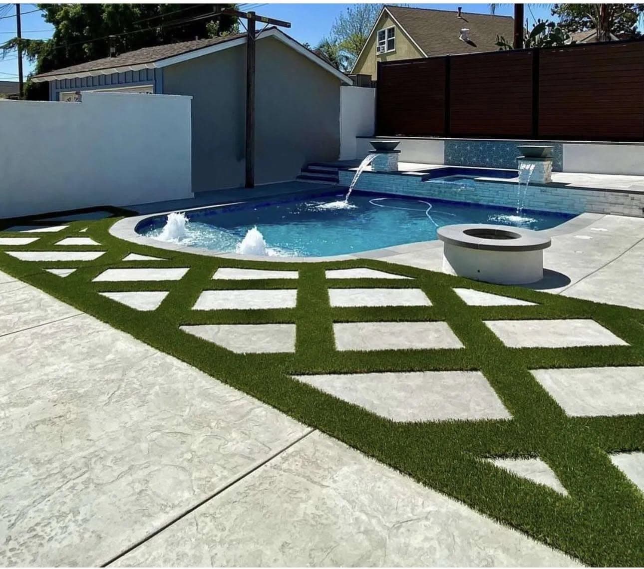 Pool, fire bowls and turf-inlay patio