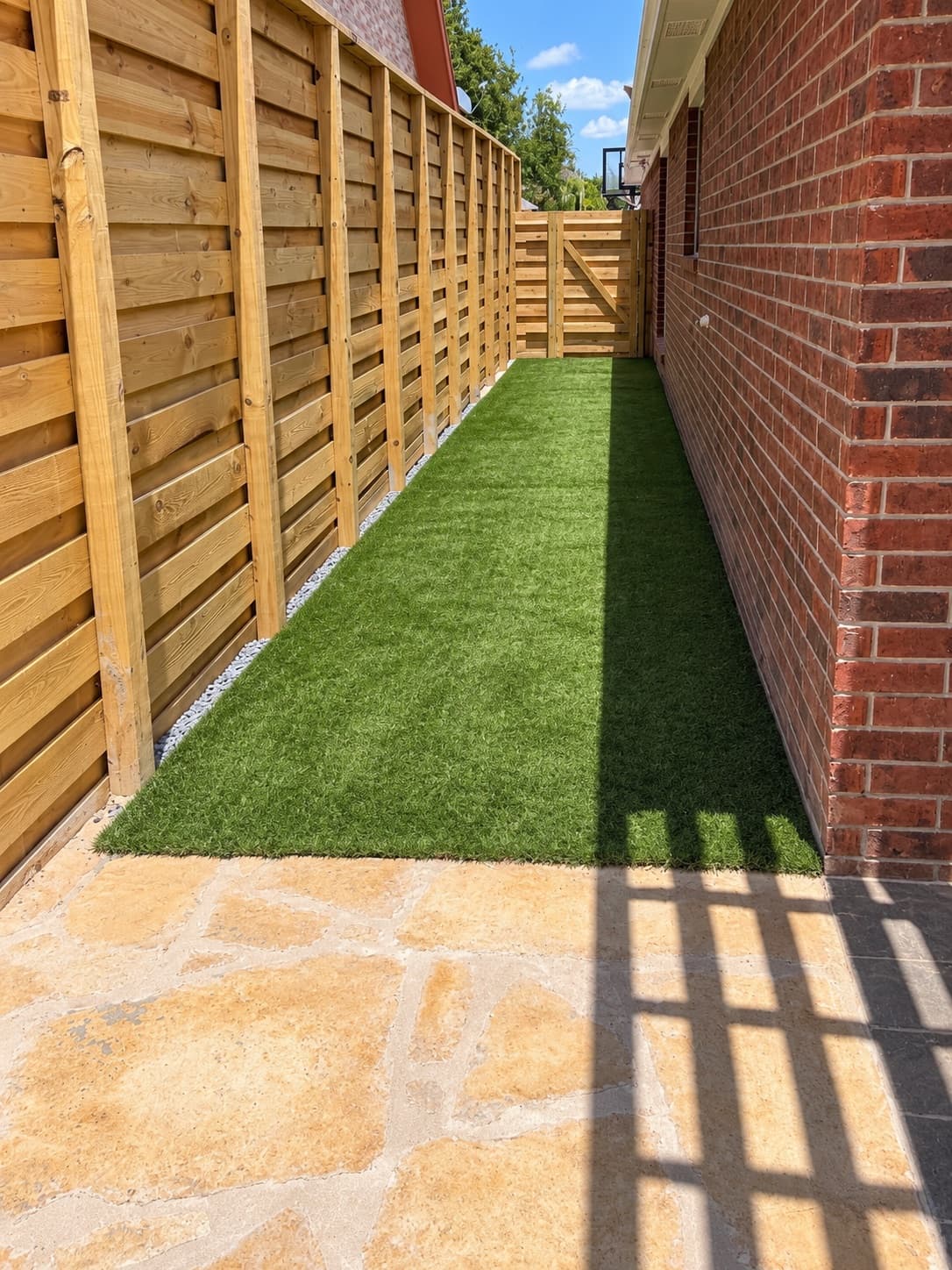 Premium artificial turf along a residential side yard